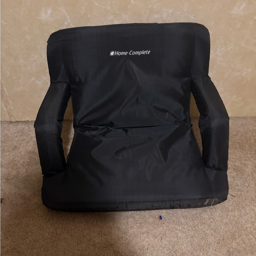 Black Adjustable Stadium Chair.   Send me offer and let’s make a deal.